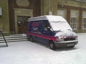 Photo - Waiting in the snow to move a grand piano from the cafe at Stanley Park, Blackpool
